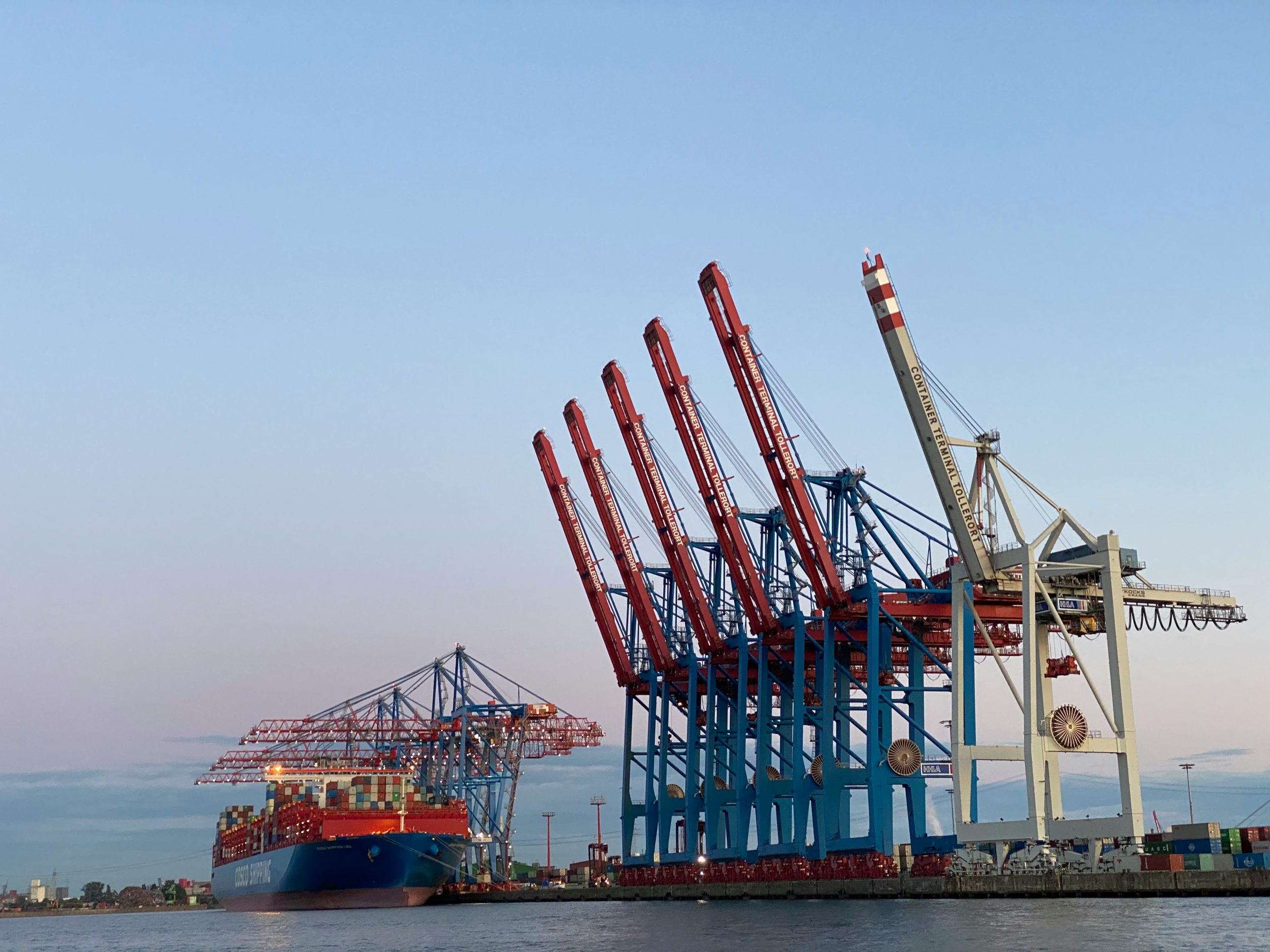 Busy maritime shipping port managing international logistics and freight